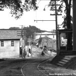 old picture of a railway through a town